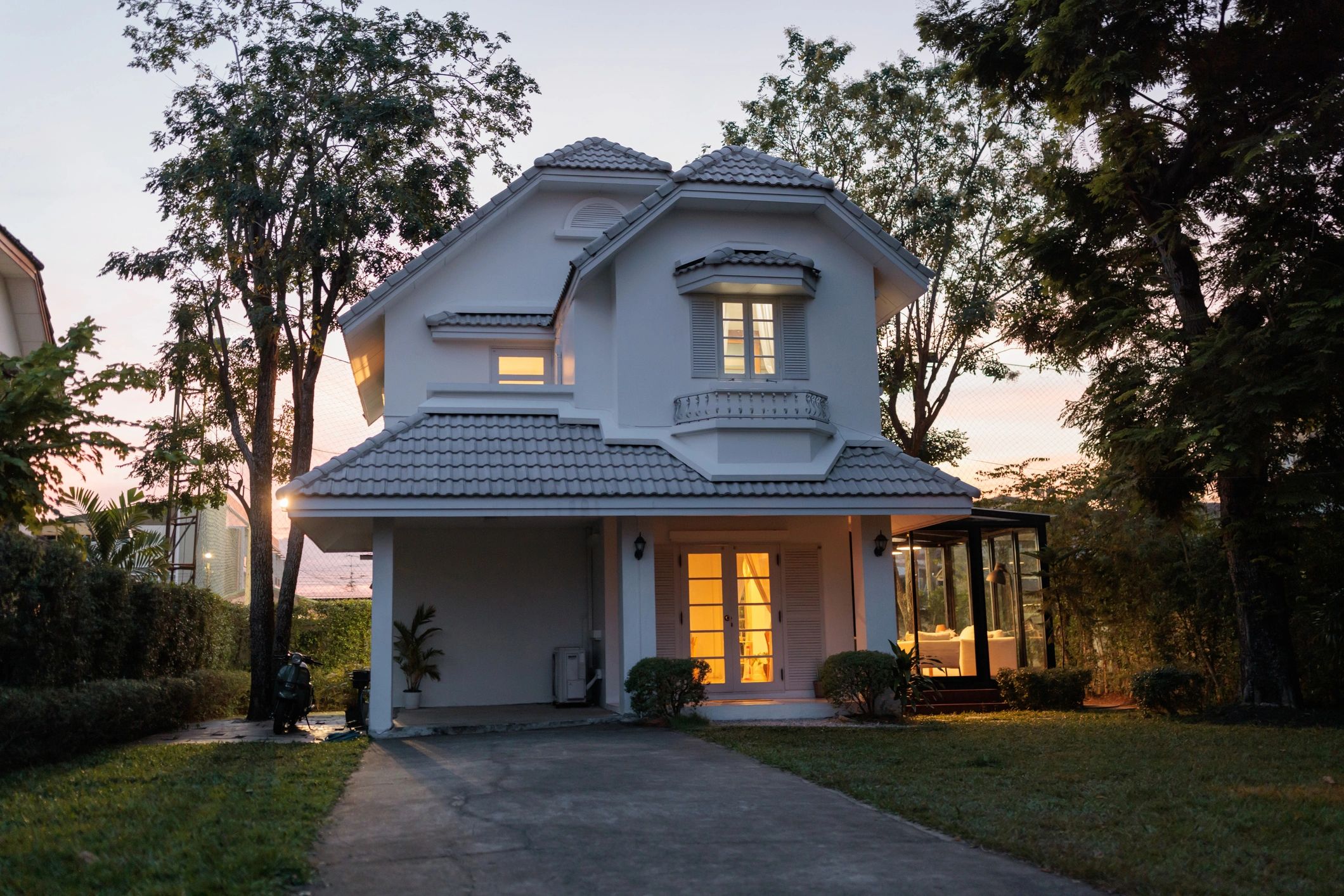 Residential home exterior at dusk